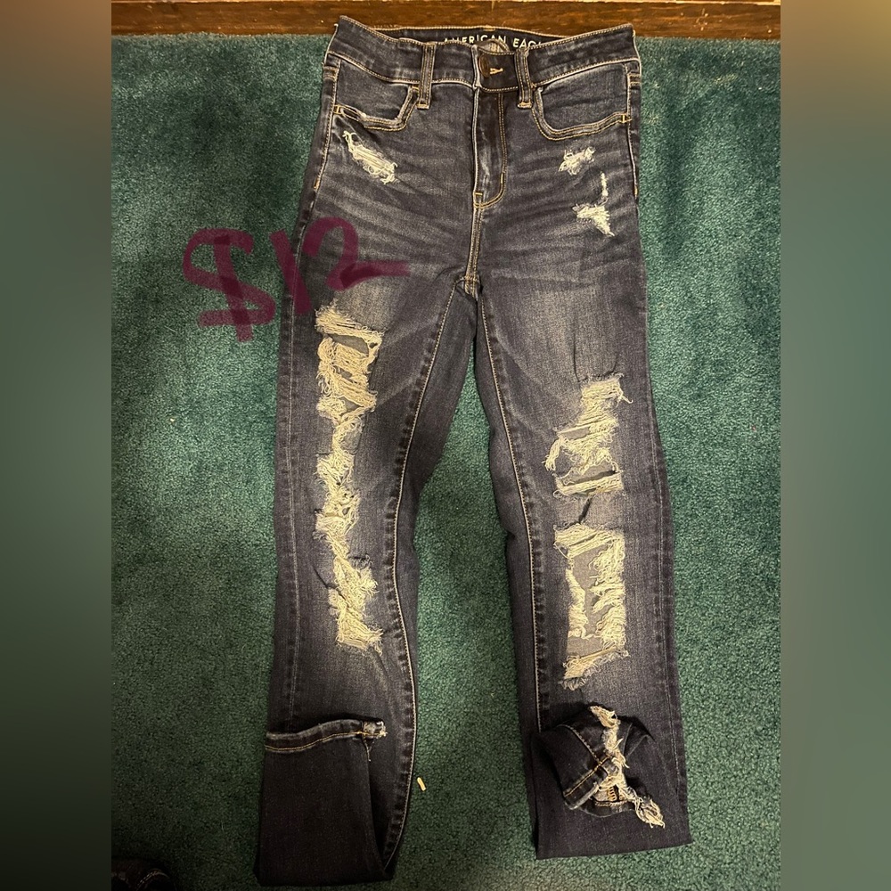 American eagle size 4; dark blue ripped skinny Jean